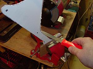 filing the plastics in a vice